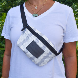 Double Pikake Lei Tyvek Fanny Pack by Yay Hawaii featuring a floral Pikake lei design on durable Tyvek material.