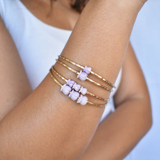 Adult Crown Flower Bangle by Yay Hawaii featuring a gold-tone bracelet with crown flower motifs and intricate floral details.