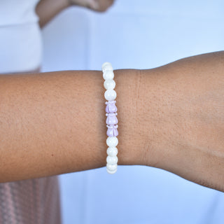 Mother of pearl round beaded stretchy bracelet with three crown flower charms, by Yay Hawaii, featuring elegant floral design.