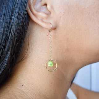 Long dangling chain hoop earrings with Pakalana flowers by Yay Hawaii, featuring intricate gold-tone design and floral accents.
