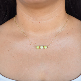 Three Pakalana flower and accent bead necklace by Yay Hawaii, featuring vibrant flowers and beads on a delicate chain.