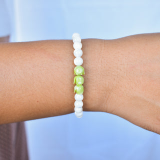 Mother of Pearl beaded stretchy bracelet with three Pakalana flowers, stylish Hawaiian jewelry by Yay Hawaii.