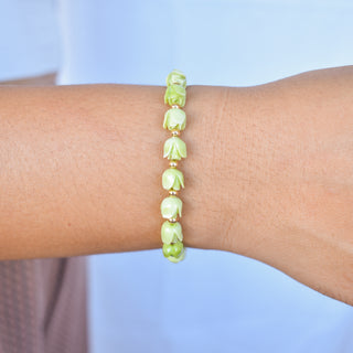 Pakalana stretchy bracelet with metal accent beads by Yay Hawaii, featuring colorful floral-inspired design and adjustable fit.