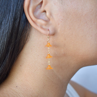 Dangling three-chain link Puakenikeni earrings by Yay Hawaii featuring delicate gold-tone chain links and floral-inspired design.