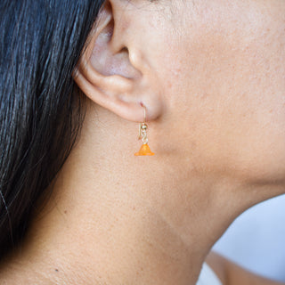 Single Drop Puakenikeni earrings by Yay Hawaii featuring delicate floral design and gold-tone hooks.