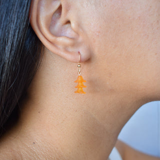 Triple Cluster Puakenikeni earrings by Yay Hawaii featuring handcrafted floral design with yellow and white blossoms.