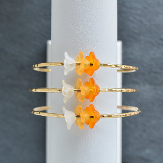 Shaded Trio Puakenikeni bangle by Yay Hawaii featuring colorful floral design and intricate detail.