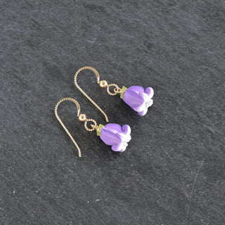Realistic Pua Kalaunu single earrings by Yay Hawaii, featuring floral design and gold-tone finish, displayed on a white background.