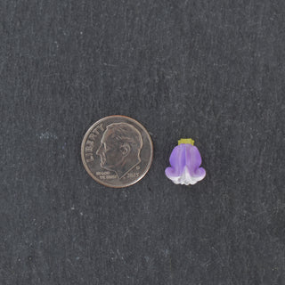 Realistic Pua Kalaunu triple linked necklace by Yay Hawaii featuring traditional Hawaiian floral designs in silver tones.