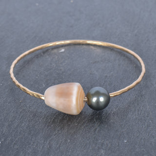 Tan cone shell bangle by Yay Hawaii featuring a smooth, rounded shell design perfect for beach-inspired jewelry styles.