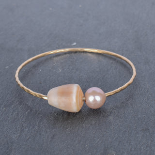 Tan cone shell bangle by Yay Hawaii featuring a smooth, rounded shell design suitable for casual or beachwear.