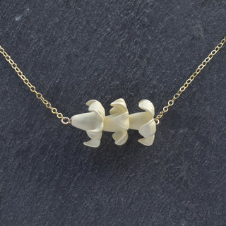 Triple Big Puakenikeni Bar Necklace from Yay Hawaii featuring colorful tropical flower pendants on a sleek chain.