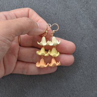 Triple linked big Puakenikeni earrings by Yay Hawaii featuring vibrant colors and intricate floral design.