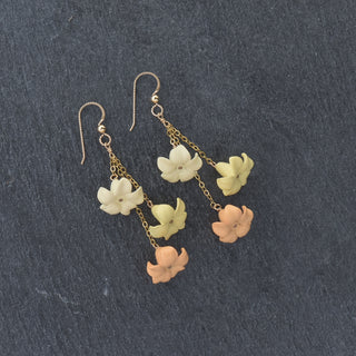 Yay Hawaii triple dangle Puakenikeni flower earrings in vibrant colors, lightweight earrings with floral design.