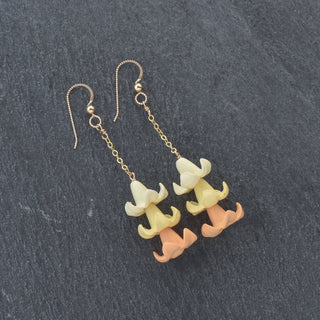 Yay Hawaii dangling triple cluster Puakenikeni earrings in vibrant colors, featuring floral-inspired design with layered flower clusters.