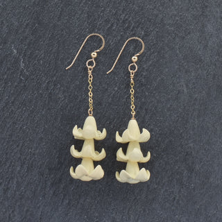 Yay Hawaii dangling triple cluster Puakenikeni earrings in vibrant colors, featuring floral design and gold-tone hooks.