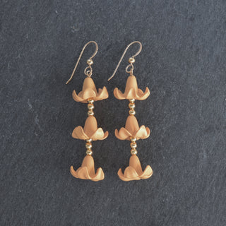 Yay Hawaii triple Big Puakenikeni 3mm accent bead stick earrings in various colors, featuring floral design and silver hooks.