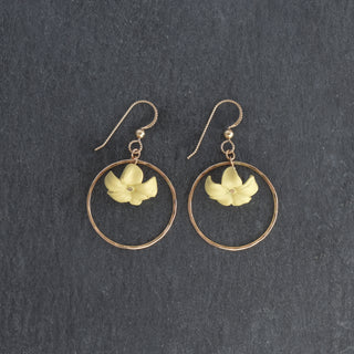 Medium hoop earrings with large Puakenikeni flower design in various colors by Yay Hawaii, showcasing the detailed floral jewelry.