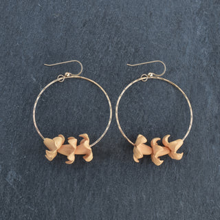 Large Yay Hawaii hoop earrings with triple big Puakenikeni flowers in various colors, showcasing bold tropical jewelry style.