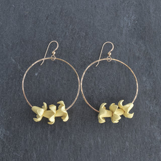 Large hoop earrings with triple big Puakenikeni design by Yay Hawaii, available in various colors, featuring tropical floral accents.