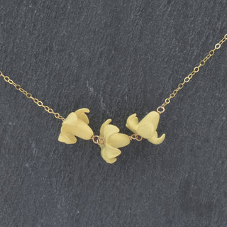 Yay Hawaii Linked Triple Big Puakenikeni Necklace with colorful flower pendants, vibrant Hawaiian jewelry for women.