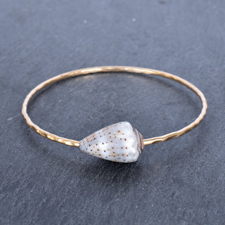 Yay Hawaii Abbreviated Cone Shell Bangle featuring a sleek, minimalist design with cone shell accents for beach-inspired style