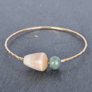 Tan cone-shaped bangle bracelet with Burmese jade accents, crafted by Yay Hawaii, displayed on a neutral background.