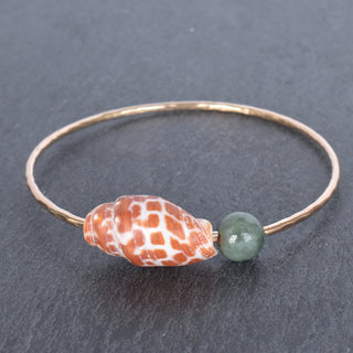 Yay Hawaii miter shell bangle with Burmese jade accents, showcasing a smooth, polished jewelry piece with natural shell and jade details.
