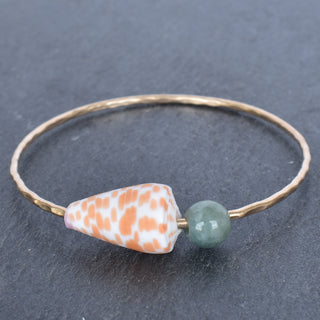 Orange cone-shaped bangle with Burmese jade accents, stylish jewelry piece from Yay Hawaii featuring vibrant color and unique design.
