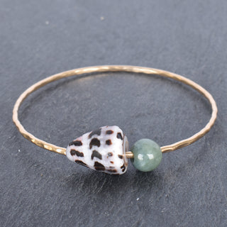 Hebrew cone shell bangle with Burmese jade accents, handcrafted jewelry by Yay Hawaii featuring ocean-inspired design.