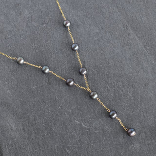 Yay Hawaii Lariat Y Necklace with 8mm black freshwater pearls, featuring a stylish and elegant jewelry design.