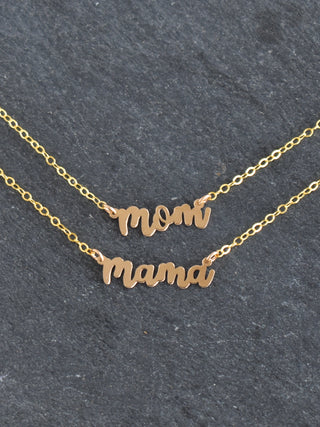 Mini Mom and Mama necklaces by Yay Hawaii featuring delicate gold chains and small pendant charms for moms and daughters.