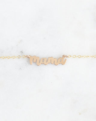 Mini Mom & Mama necklaces by Yay Hawaii featuring delicate gold chains and small heart charms, perfect for mother and child.
