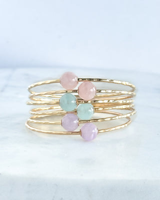 Elegant gemstone bangle featuring rose quartz, aquamarine, and lavender amethyst beads on a Yay Hawaii jewelry piece.