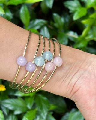 Elegant gemstone bangle featuring rose quartz, aquamarine, and lavender amethyst beads by Yay Hawaii.