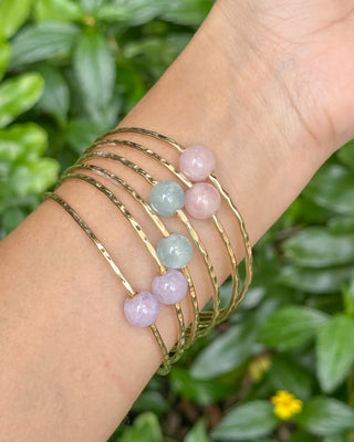 Yay Hawaii gemstone bangle featuring rose quartz, aquamarine, and lavender amethyst beads on a silver clasp.