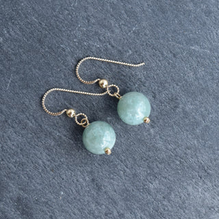 Yay Hawaii single jade drop earrings with 8mm or 10mm jade beads hanging from gold hooks, elegant and minimalist jewelry design.