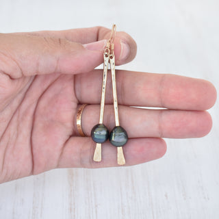 Dangling pearl earrings with Tahitian or freshwater pearls, featuring elegant silver hooks, by Yay Hawaii.