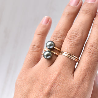 Tahitian Pearl Double Bypass Ring by Yay Hawaii featuring a lustrous black pearl and sterling silver band design.