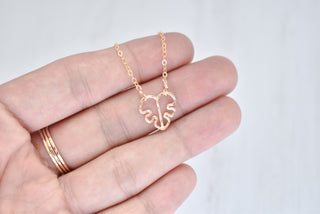 Yay Hawaii cute monstera leaf necklace with silver chain, tropical jungle-inspired jewelry accessory, close-up view