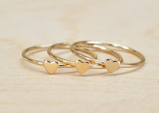 Silver Tiny Heart Stacking Ring by Yay Hawaii, featuring a delicate heart design, perfect for layered jewelry styles.