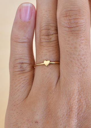 Tiny Heart Stacking Ring by Yay Hawaii featuring a delicate heart design in sterling silver, perfect for layering or everyday wear.