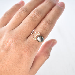 Silver crescent moon pearl bypass ring by Yay Hawaii with a sleek design and a single pearl accent on a silver band.