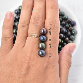 Silver crescent moon pearl bypass ring by Yay Hawaii featuring a sleek design with a pearl accent and polished finish.