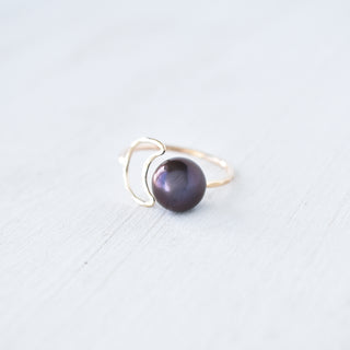 Silver crescent moon pearl bypass ring by Yay Hawaii featuring a sleek design with a luminous pearl accent.