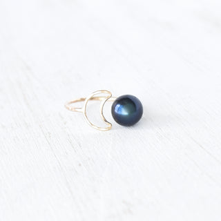 Silver crescent moon pearl bypass ring by Yay Hawaii featuring a sleek band and a luminous pearl accent.