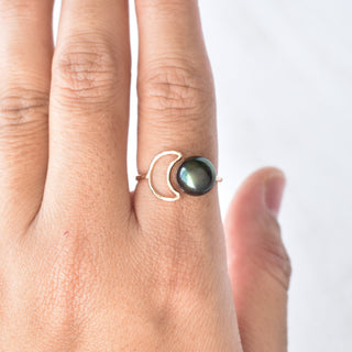 Silver crescent moon pearl bypass ring by Yay Hawaii with a sleek design and a lustrous pearl accent.