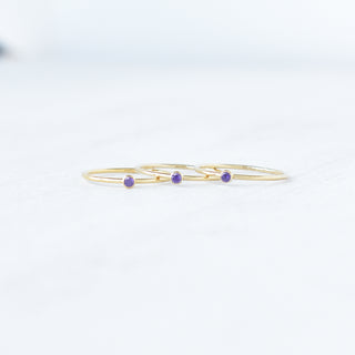 Purple CZ stacking ring featuring February amethyst birthstone from Yay Hawaii, with a sleek band and sparkling gemstone.
