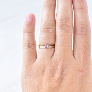 Purple CZ stacking ring featuring February amethyst birthstone, crafted by Yay Hawaii, with a sleek, stacked design.