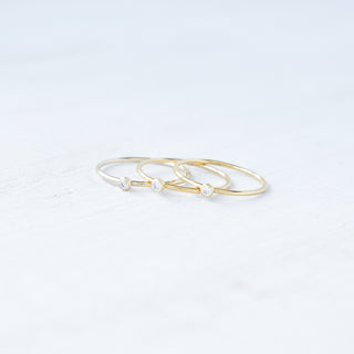 Clear CZ stacking ring with April diamond birthstone from Yay Hawaii, showcasing a silver band with sparkling cubic zirconia accents.